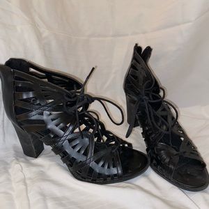 Black high heeled shoe